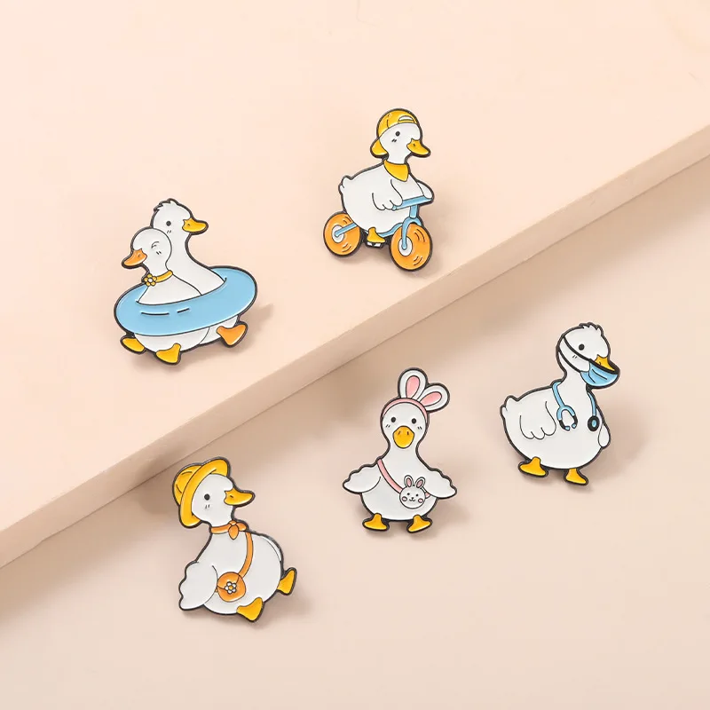 Lovely Animal Enamel Pin Custom Goose Duck Shopping Swim Cycling Brooch Bag Lapel Pin Cartoon Funny Badge Jewelry Gift for Kid