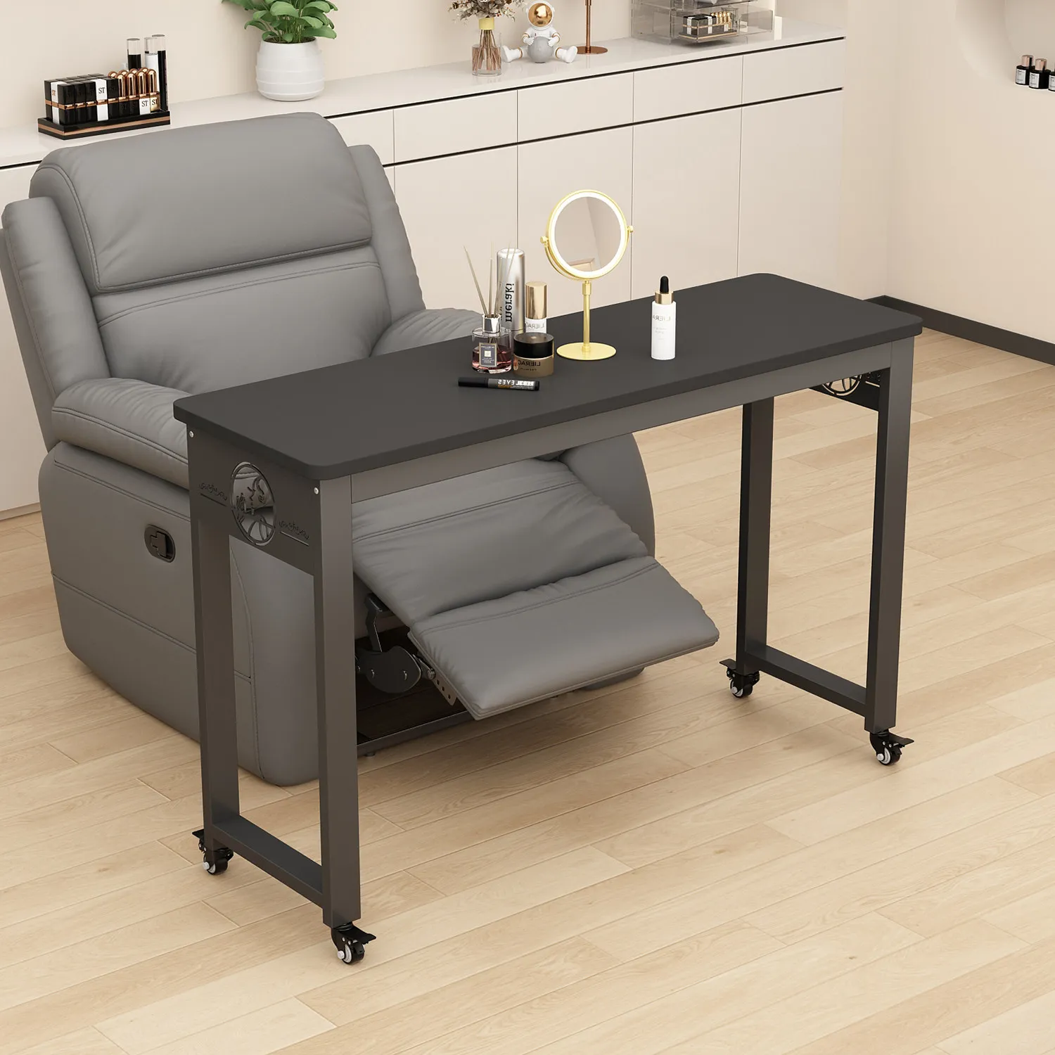 Light luxury, mobile manicure table with vacuum cleaner, designed for use in a cinema-style setting, with a single layer and