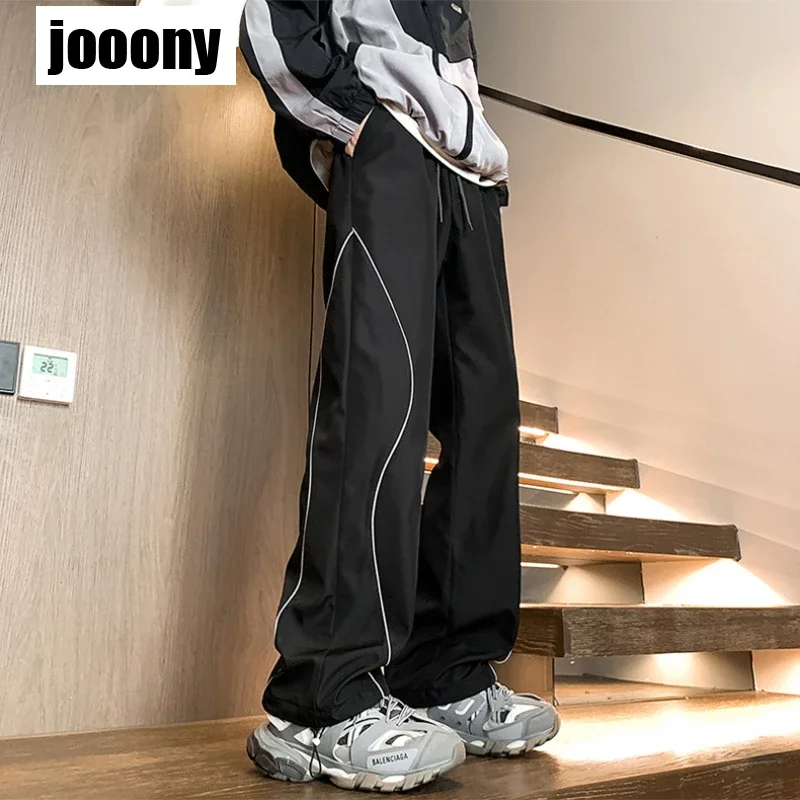 سراويل هاراجوكو لربيع وصيف 2024 سراويل رياضية كلاسيكية يومية جديدة ذات إحساس متقدم ملابس خروج هيبي واسعة الساق للركض تصميم حس #6