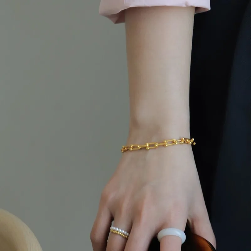 Projeto retro do bracelete do ouro