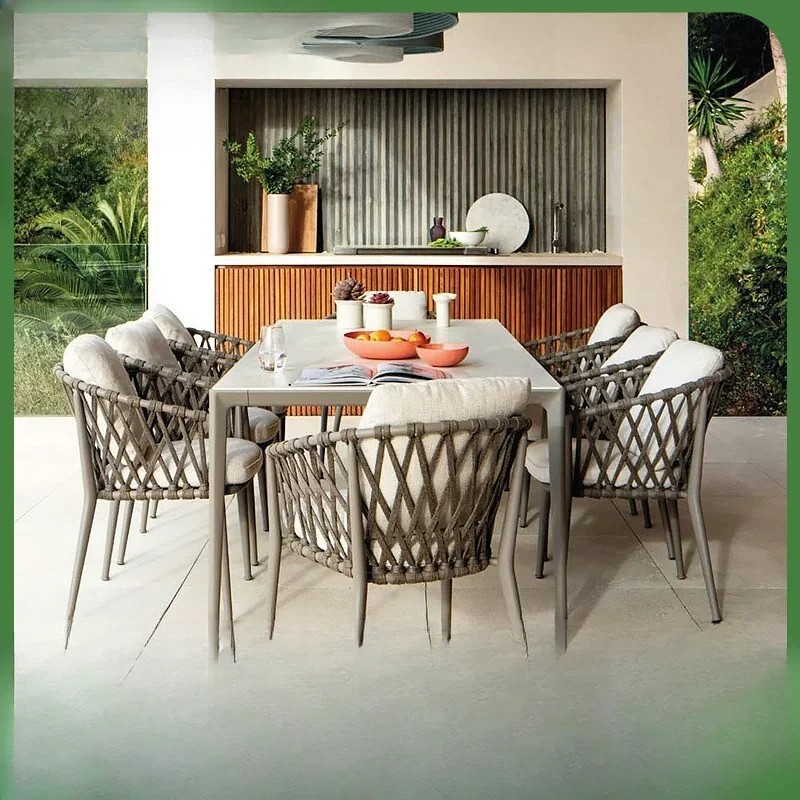 

Nordic Outdoor Rattan Chair Hotel Homestay Outdoor Villa Leisure Rattan Dining Table and Chair Combination