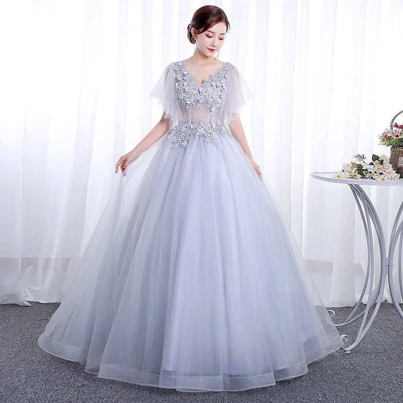 

2026 Autumn Women's New Embroidered V-neck Evening Dress Fashionable and Slim Long Dress Art Exam Host Colorful Puff Dress