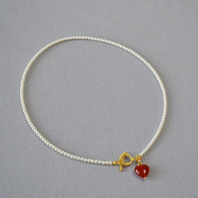 

Korean INS Fashion Simple Elegant Pearl Light Luxury Niche Red Agate Heart OT Buckle Necklace Collarbone Chain