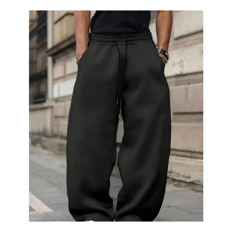 

Подходит для ношения в осенне-зимний период: мужские свободные брюки с широкими штанинами, однотонные, на шнурке, в повседневном стиле, длинные спортивные брюки.