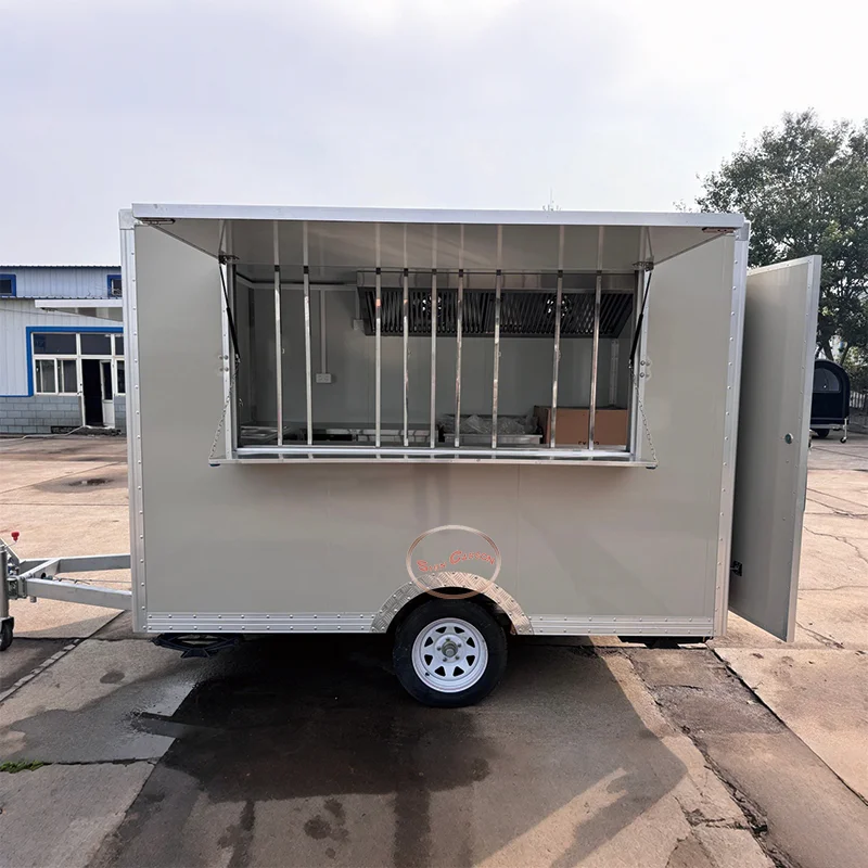 The creamy white body of the outdoor food trailer exudes a soft, gentle warmth and presents an elegant freshness