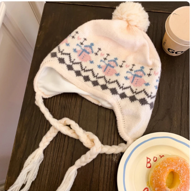 اليابانية معرض جزيرة نمط ثلج الجاكار الأذن البلوز قبعة قبعة للنساء الخريف والشتاء سميكة الدافئة الدانتيل متابعة قبعة متماسكة