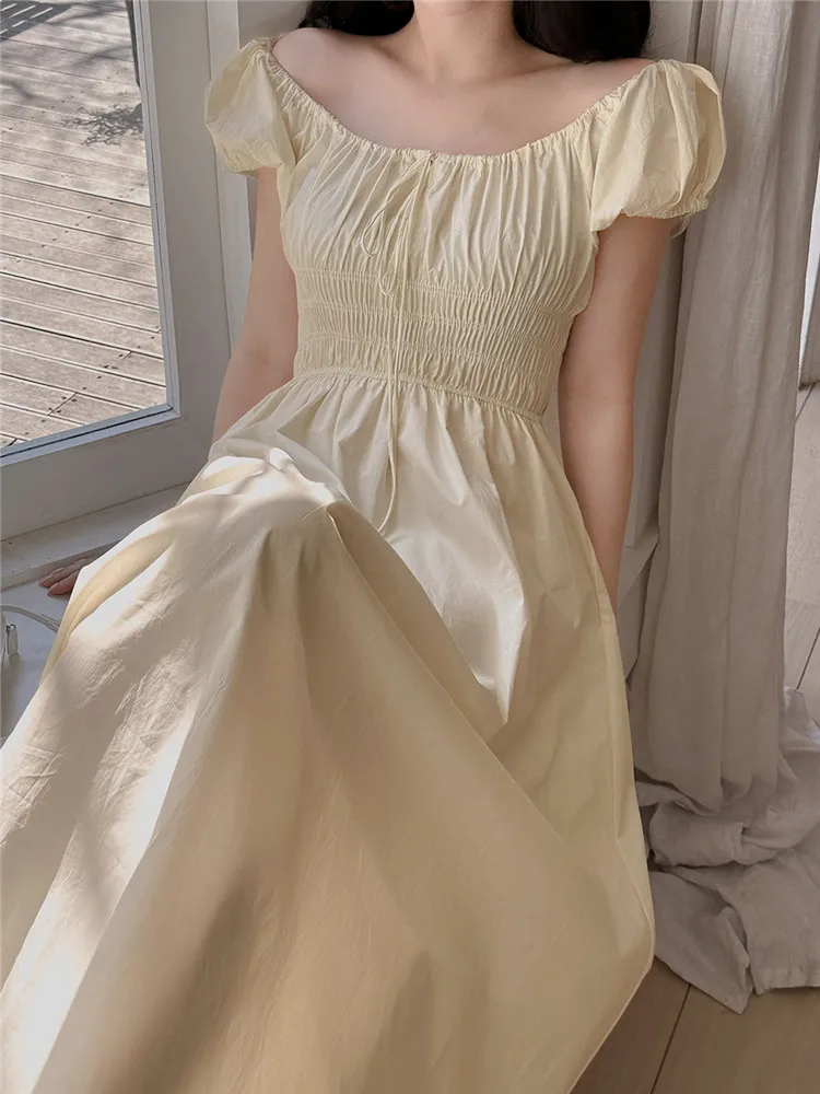 فستان صيفي على الطراز الكوري برقبة على شكل حرف U تنورة نسائية طويلة على شكل حرف a تنورة طويلة للتخسيس وأكمام فقاعية وخصر مربو...