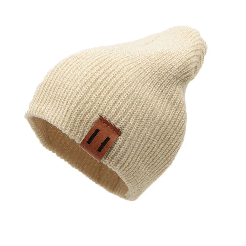 Children knitted wool pullover hat autumn and winter leather label solid color warm baby knitted cap with parent-child models