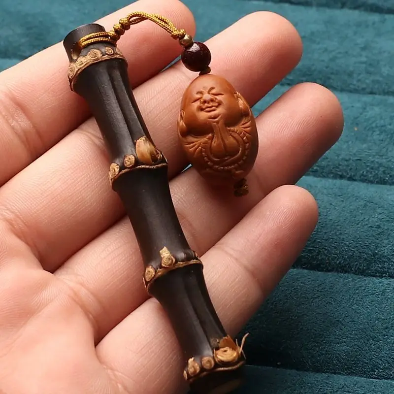

Carved Bamboo Root Olive Pit Figurine Monk Charm Solid Wood Handheld Art