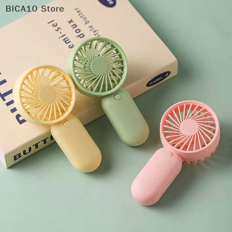 Colorful Portable Handheld Mini Fan AAA Battery Power Supply Mute Air Cooling Cooler For Summer Hot Trip Travel Home Office