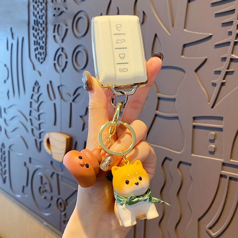 Creative Couple Buckle Strap Scarf Shiba Inu Doll Key Chain Cute Funny Dog With Dog Shit Fortune Keychain Gift for Men Women Bag