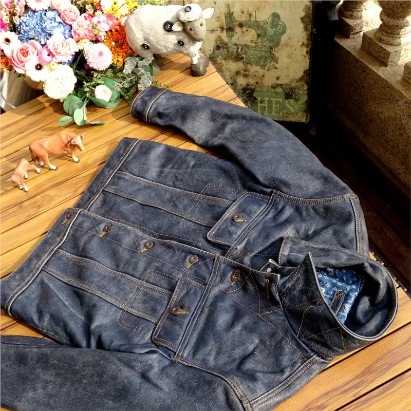 

Heavily washed polished and aged indigo tea core calfskin style leather coat