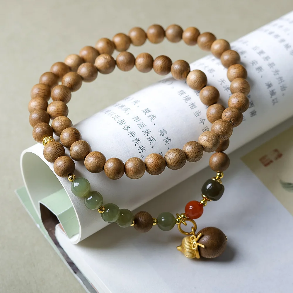 

Original design yellow kiannan incense wood double circle strings play and field jade nanhong agate new Chinese bracelet