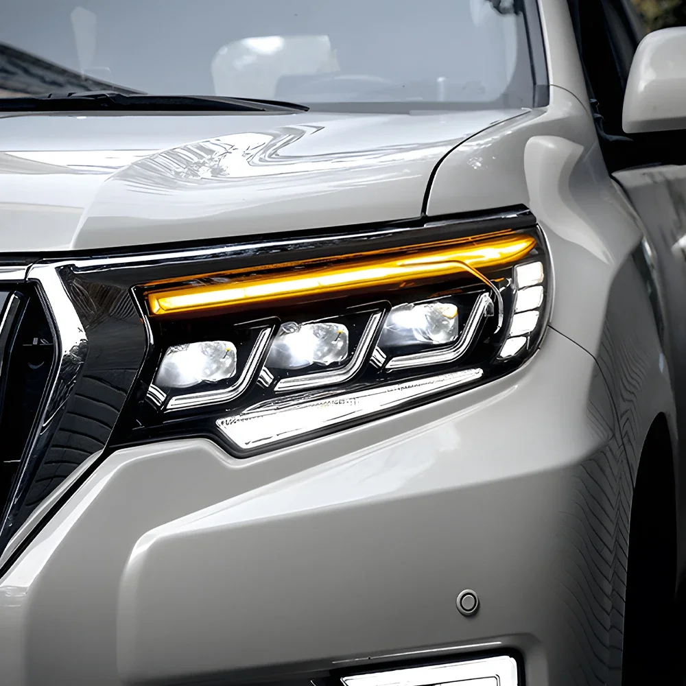 

Модифицированная передняя лампа автомобиля для Toyota Prado 2018-2023, светодиодная автоматическая фара, обновление, три линзы проектора, горячая распродажа, аксессуары