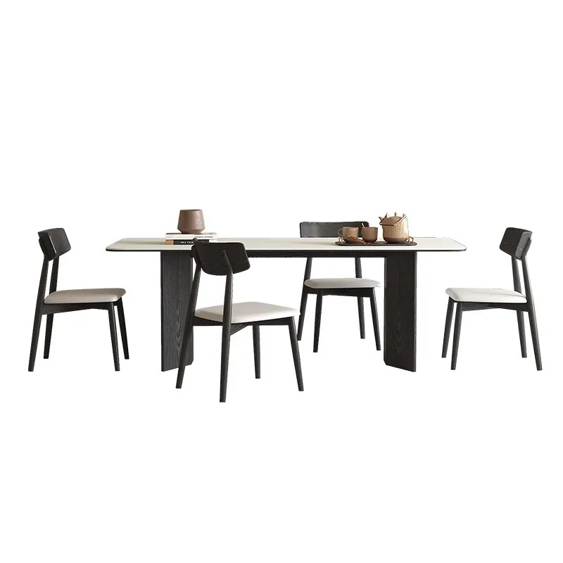 

Solid wood rock slab dining table Italian home dining table black simple table small apartment designer light luxury workbench