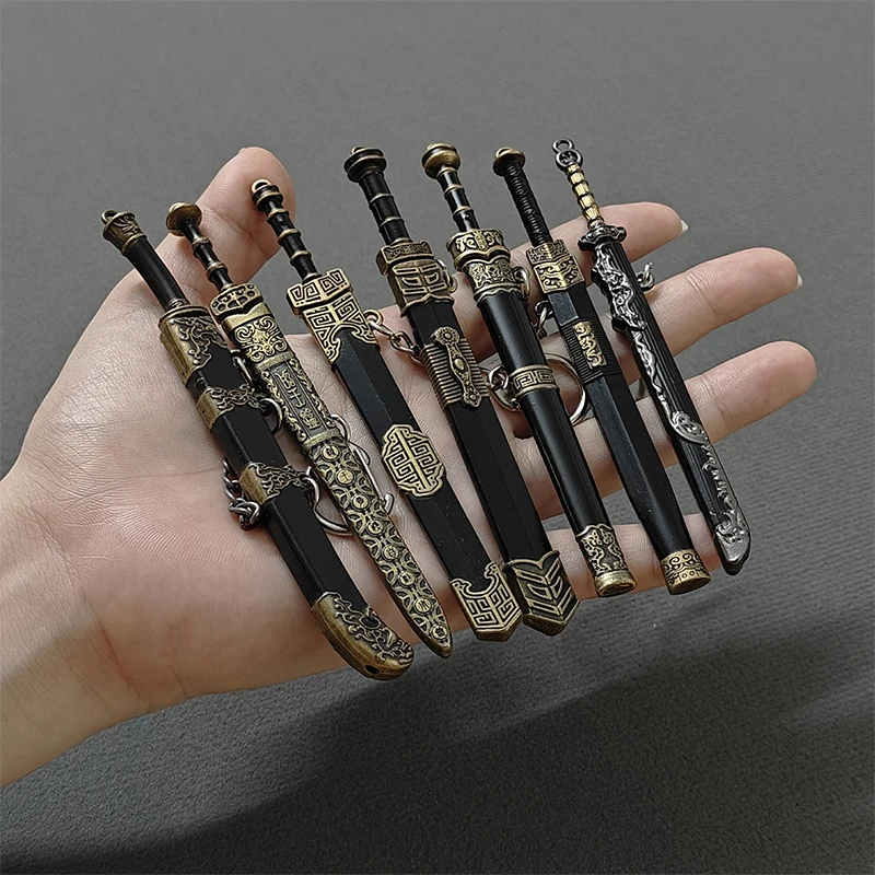 1pc Novelty Mini Sword Shape Pendant Keychain Creative Weapon Model Toy Key Ring Fashion Backpack Decoration Accessories Gifts