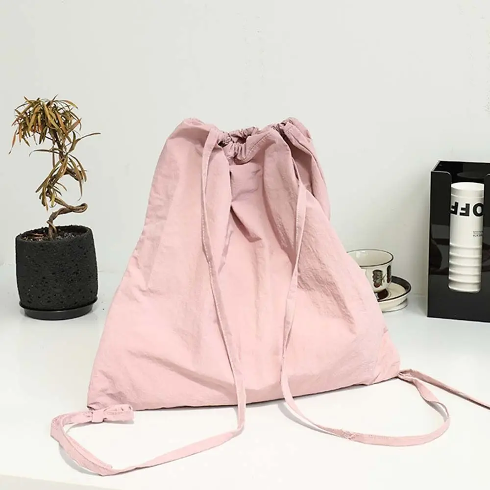 Mochilas de cordão de grande capacidade para meninas, estilo coreano, design de nicho, sacola leve de nylon macia, bolsa de ombro de cor sólida