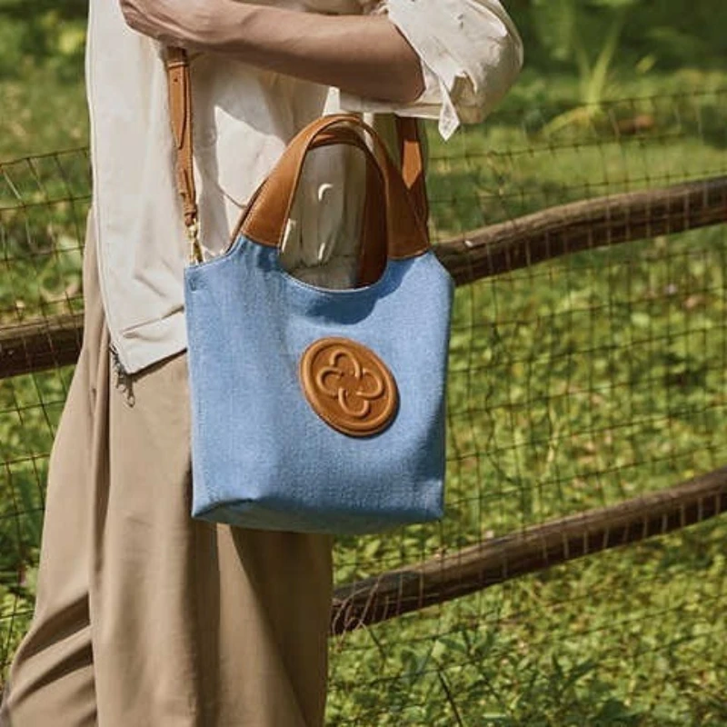 Cassile جديد المتخصصة الدنيم الأزرق سلة الخضار حقيبة المرأة سترة حقيبة يد كتلة اللون تصميم Crossbody حمل حقيبة