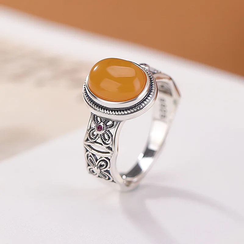 

Amber S925 Sterling Persimmon Twist Oval Hollow Silver Ring