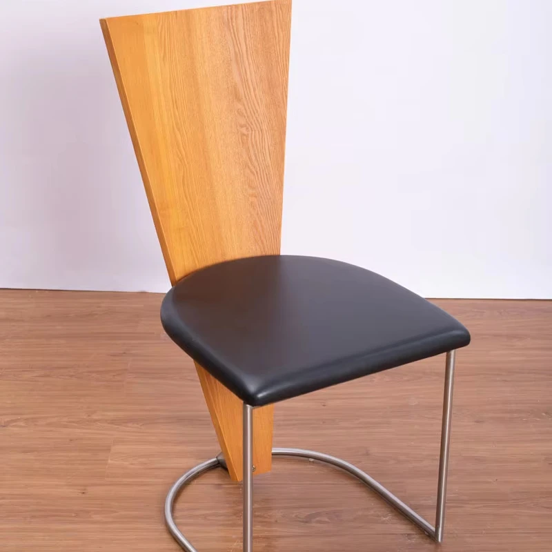 A Single Chair Made From a Combination of Three Different Materials.