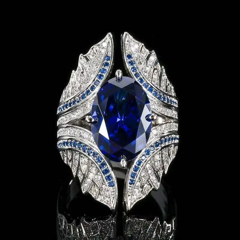 

Новое медное кольцо с серебряным покрытием, имитация сапфира, инкрустированное бриллиантами, в стиле «Ветер», с полным ореолом из бриллиантов, открытое, экстравагантное, в стиле легкой роскоши