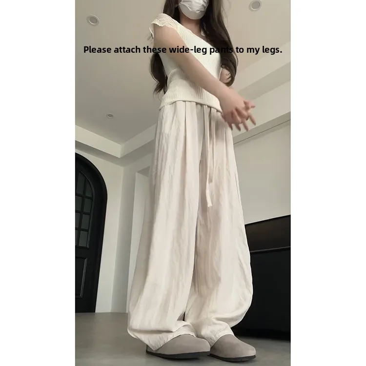 กางเกงลำลองผ้าลินินสไตล์เกาหลีสำหรับผู้หญิง รุ่นใหม่สำหรับฤดูร้อน เนื้อผ้าเบาสบาย ระบายอากาศได้ดี ทรงหลวม ช่วยให้ดูผอมเพรียว ยาวคลุมเท้า