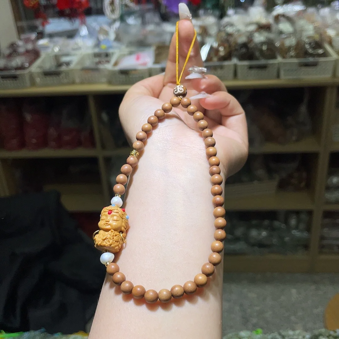 

Barbie sandalwood with sandalwood Tara mobile phone pendant pendant, fashionable and versatile, simple and niche exquisite bag h