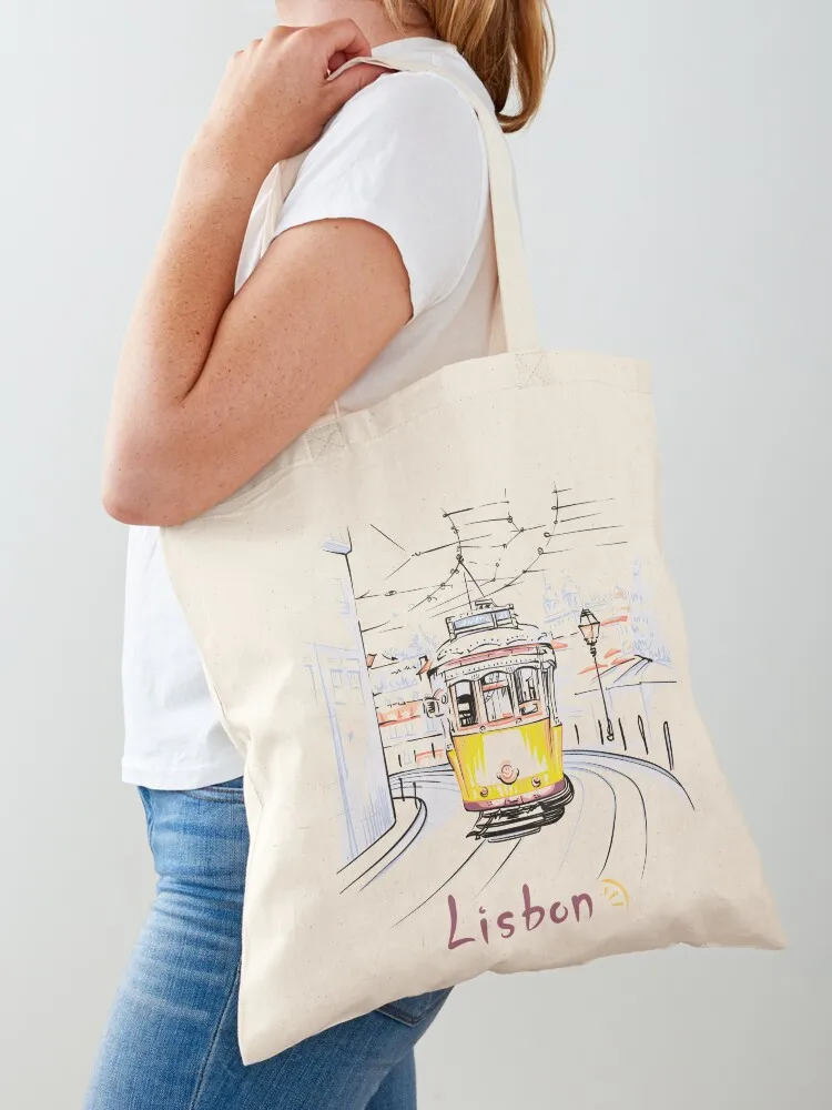 

Famous vintage yellow 28 tram in Lisbon Tote Bag Big bag large size bags canvas bags