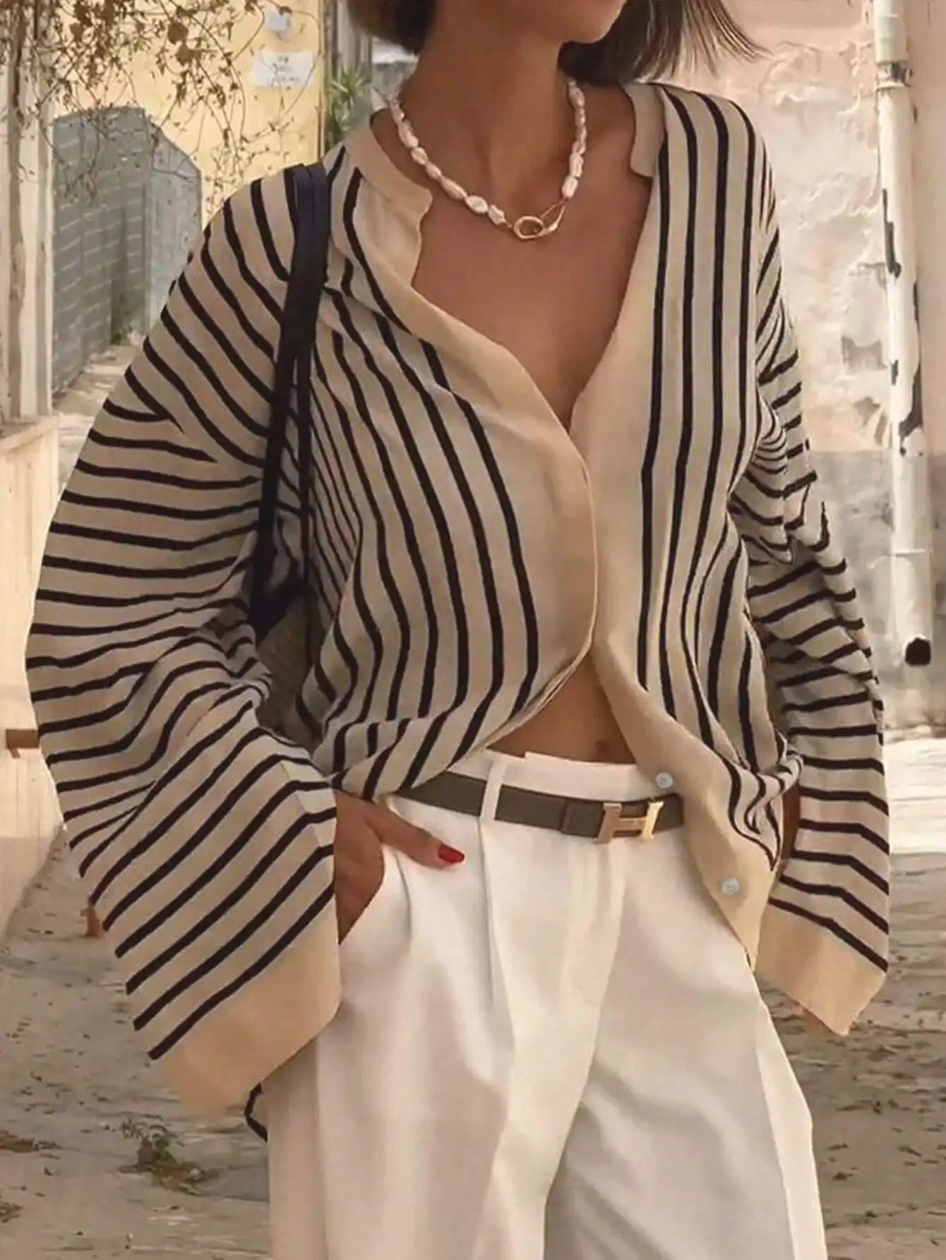 

Женская элегантная повседневная свободная блузка в полоску на весну