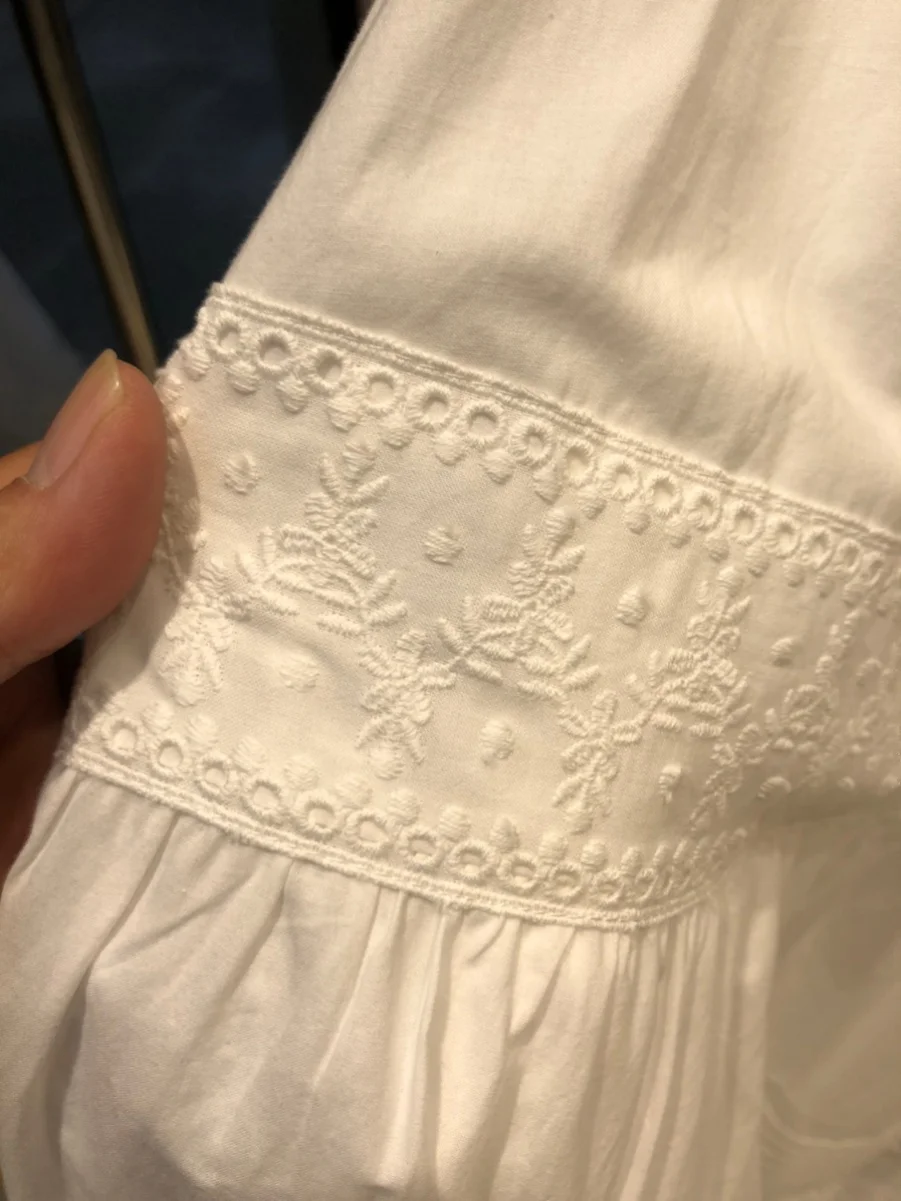 กระโปรงทรงเอเอวสูงปักลายฉลุสีขาวสไตล์เค้กอบสำหรับผู้หญิง กระโปรงมิดิทรงเอ สไตล์หวานๆ สำหรับฤดูใบไม้ผลิ