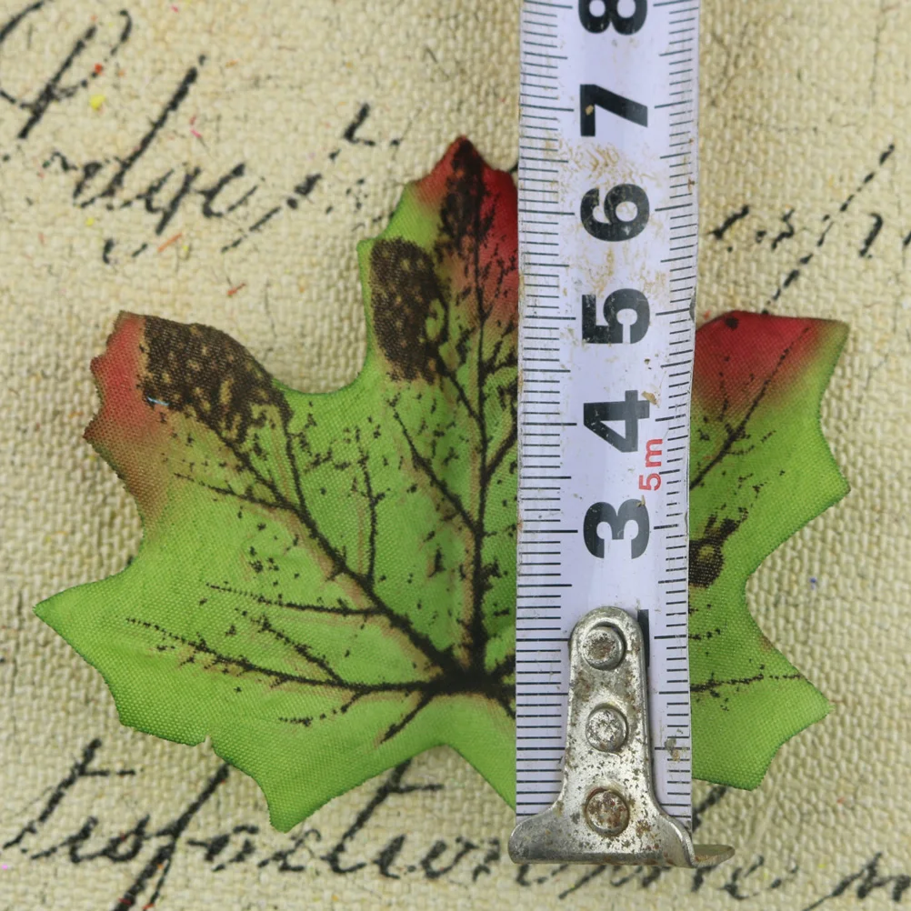 

50 Pcs Simulated Maple Leaf Decoration Fake Leaves Decorative Decorate Artificial Photo Props