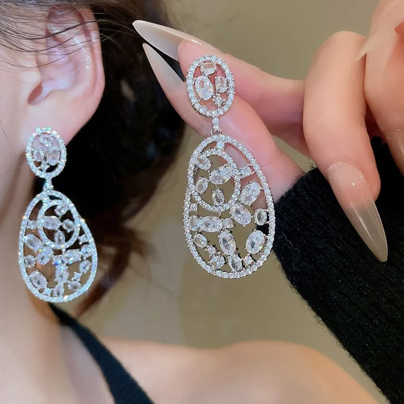 

Minar New Luxury Full CZ Cubic Zirconia Hollow Oval Geometric Long Dangle Earrings for Women Silver Plated Copper Party Jewelry