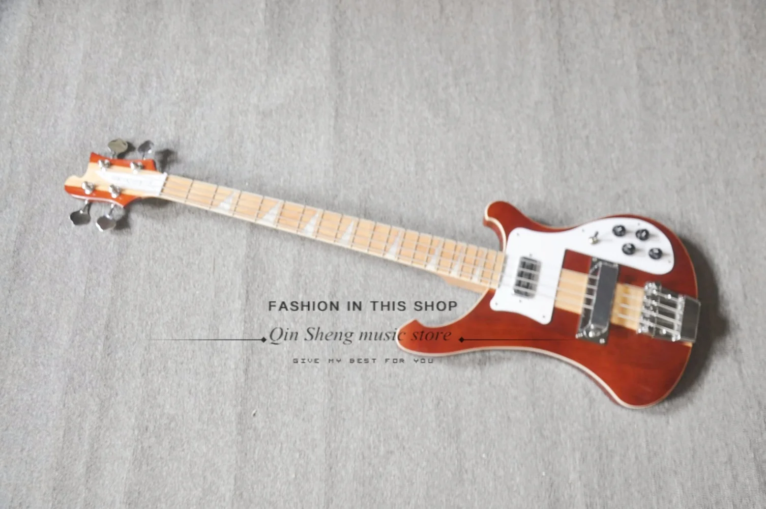 4 string Red brown guitar, fixed bridge, maple neck through the solid body, white pickup board, maple fretboard