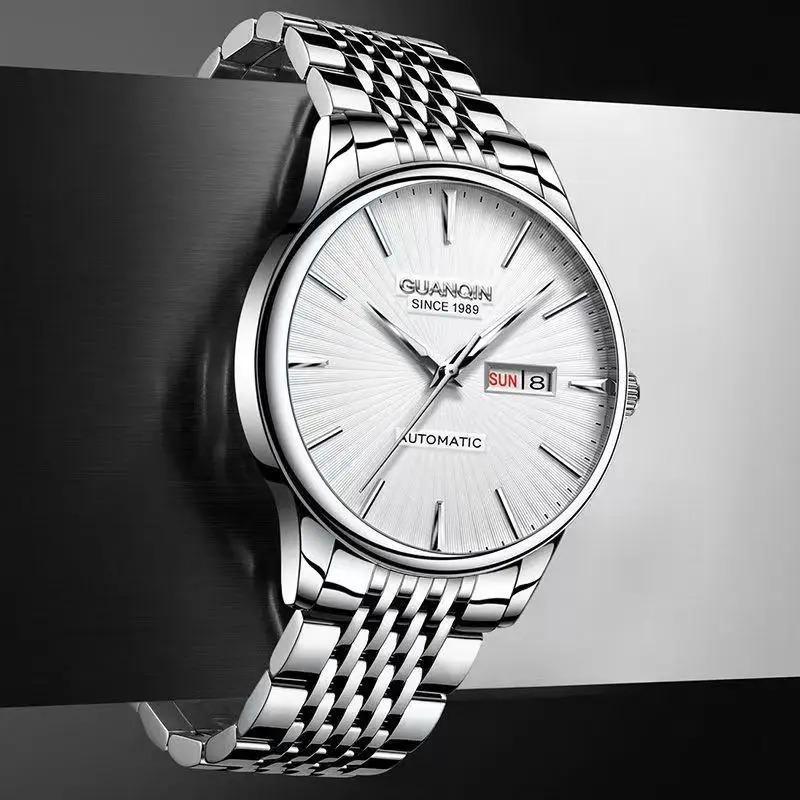 ساعة Guanqin ساعة ميكانيكية للرجال أوتوماتيكية بالكامل مقاومة للماء وإضاءة ليلية عصرية متدرجة اللون ساعة رجالية بسيطة ذات جودة سويسرية
