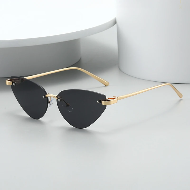 2026 Dreieckige Randlose Cat-Eye-Sonnenbrille für Damen Europäische Mode Stilvolle Rahmenlose Metall-Freizeitbrille UV400