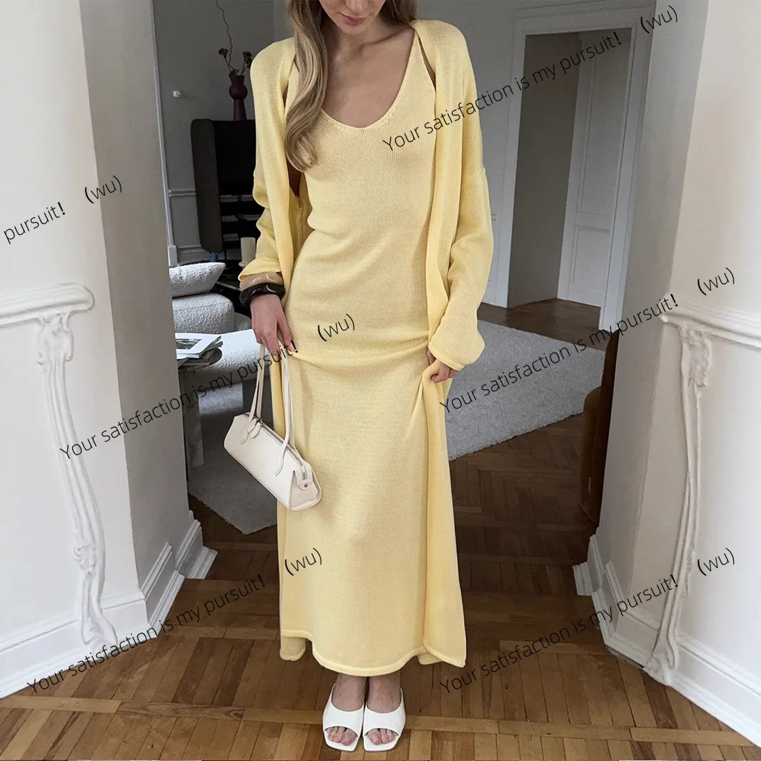 

Knitted hollow vest long skirt + long-sleeved cardigan suit women's soft Europe and America