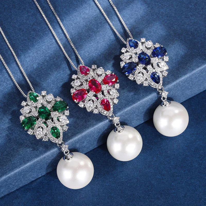 

Новая модель украшения с белыми жемчужинами, модными цветными камнями и двухцветным кулоном, инкрустированным бриллиантами, 16 мм.