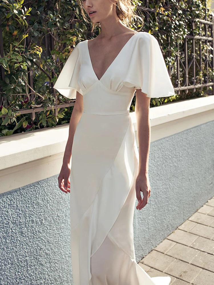 エレホワイト アシンメトリーVネック バルロングドレス フレアスリーブ サテン素材 ウエストシェイプデザイン レディース