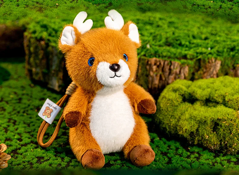 Plum Blossom Deer Plüschtierpuppe, Rucksackanhänger, kreatives Handgelenkspaddel, liegende Hirschpuppe