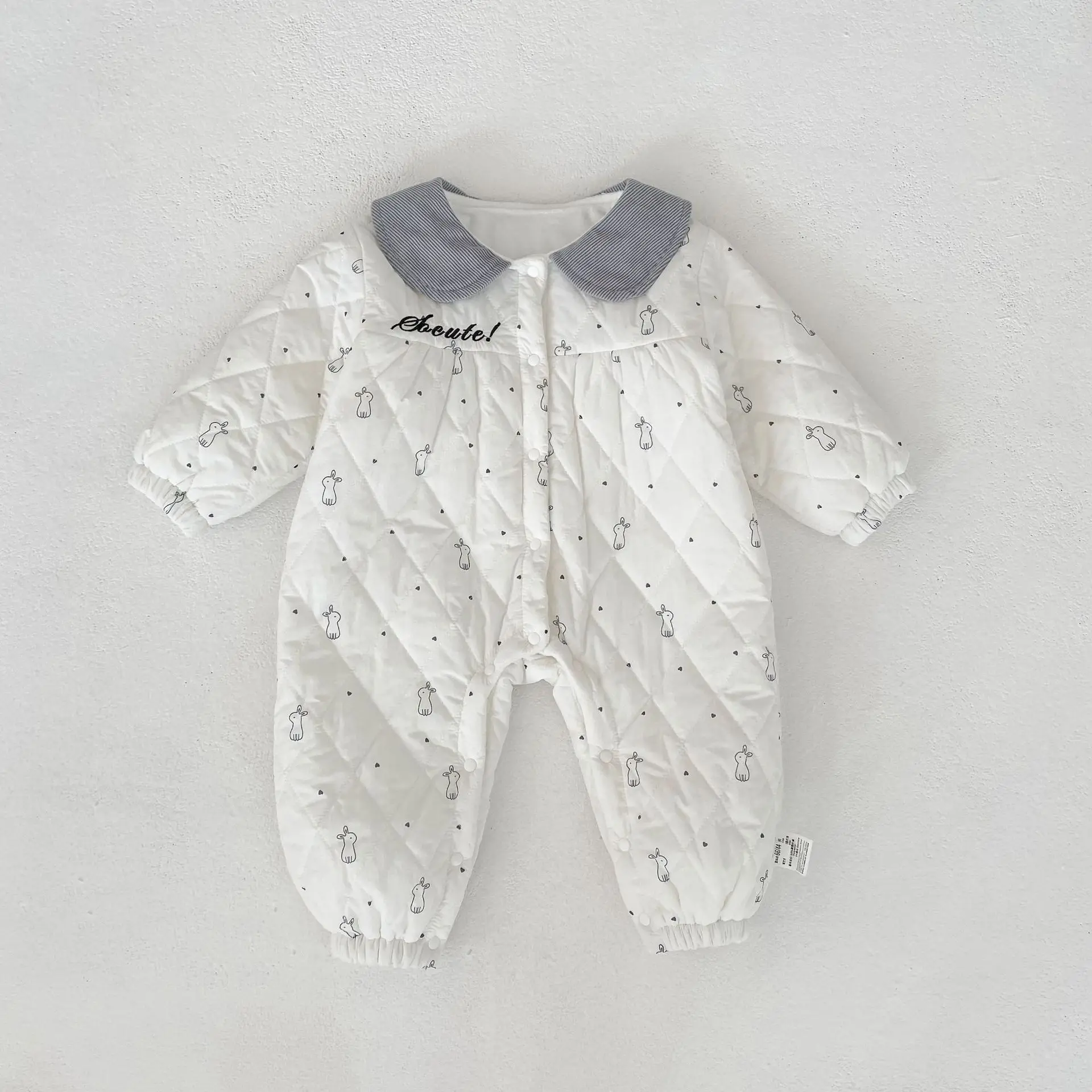 

Winter clothing new long sleeved jumpsuit for baby girls in winter, with cotton and velvet added, worn with a stylish and long c