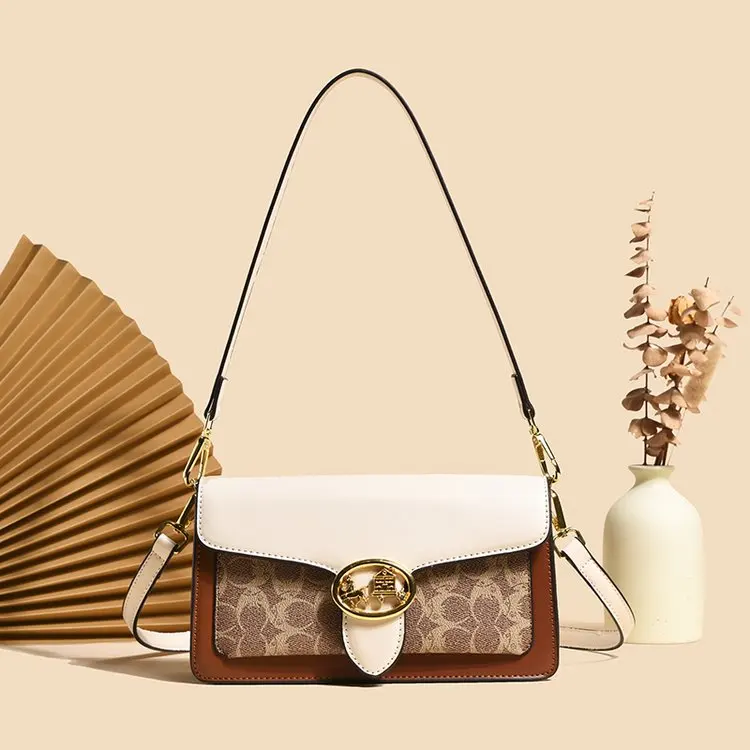 Classic Chic Women's Diaper Bag Elegant Leather Large Capacity Designer Tote Luxury Minimalist Vintage Fashionable Commuter Bag