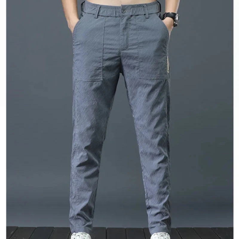 

Korean Fashion Summer New Men's Elastic Waist Solid Pockets Thin Style Ice Silk Quick DryingTrend Versatile Loose Straight Pants