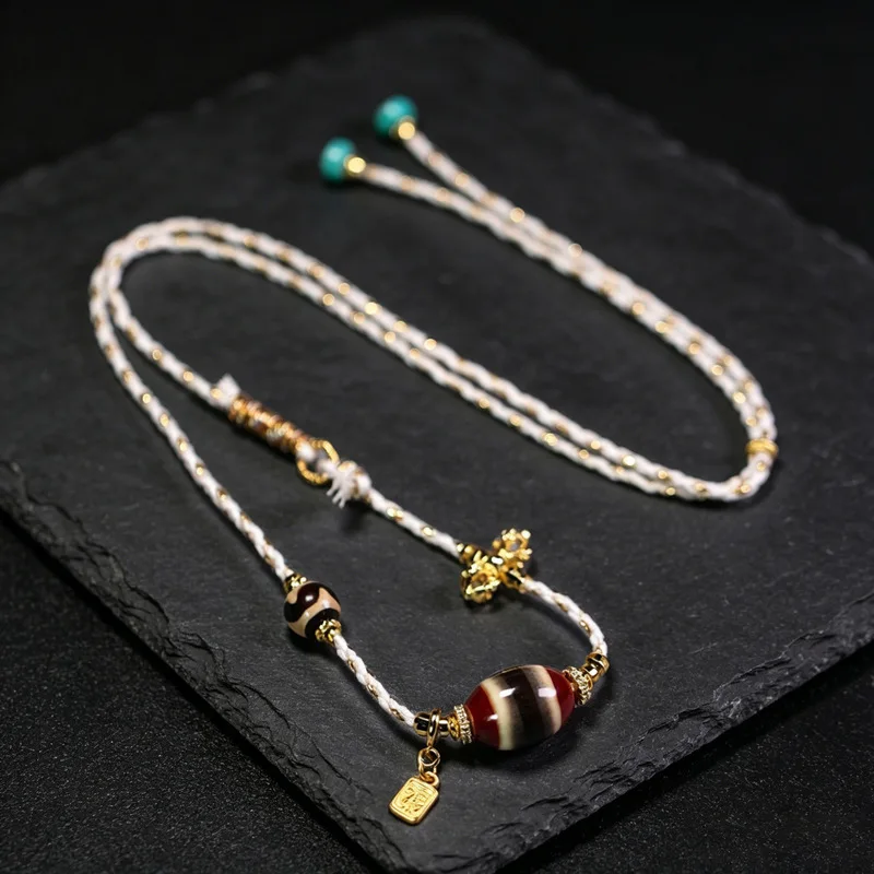 Tibetan natural genuine old mine raw stone agate red thread Dzi bead clavicle necklace approximately 12*16mm