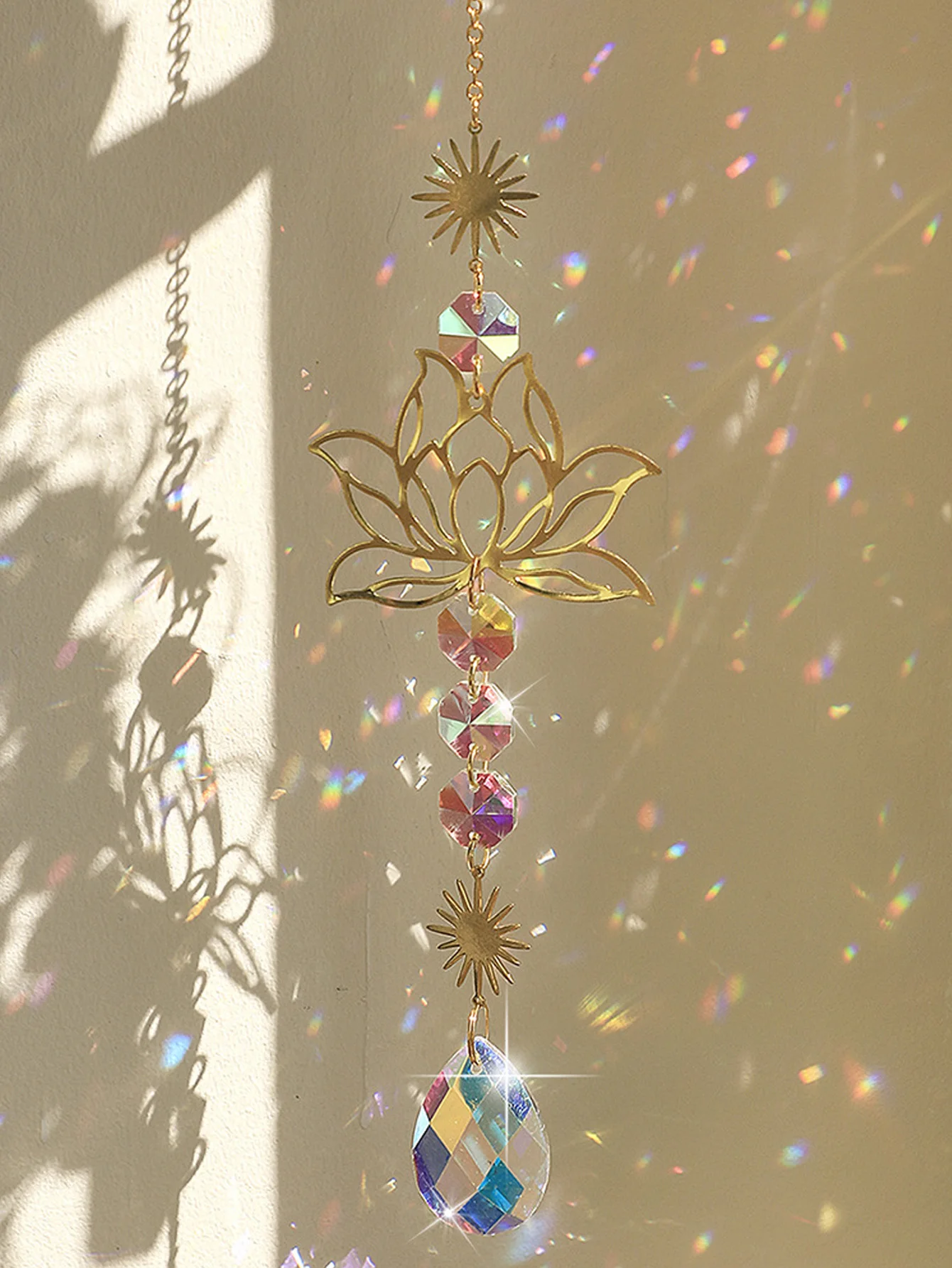 A Golden Lotus-shaped Sun Garden Art Craft, Adorned with A Colorful Droplet-shaped Crystal Pendant, Suitable for Outdoor Hanging