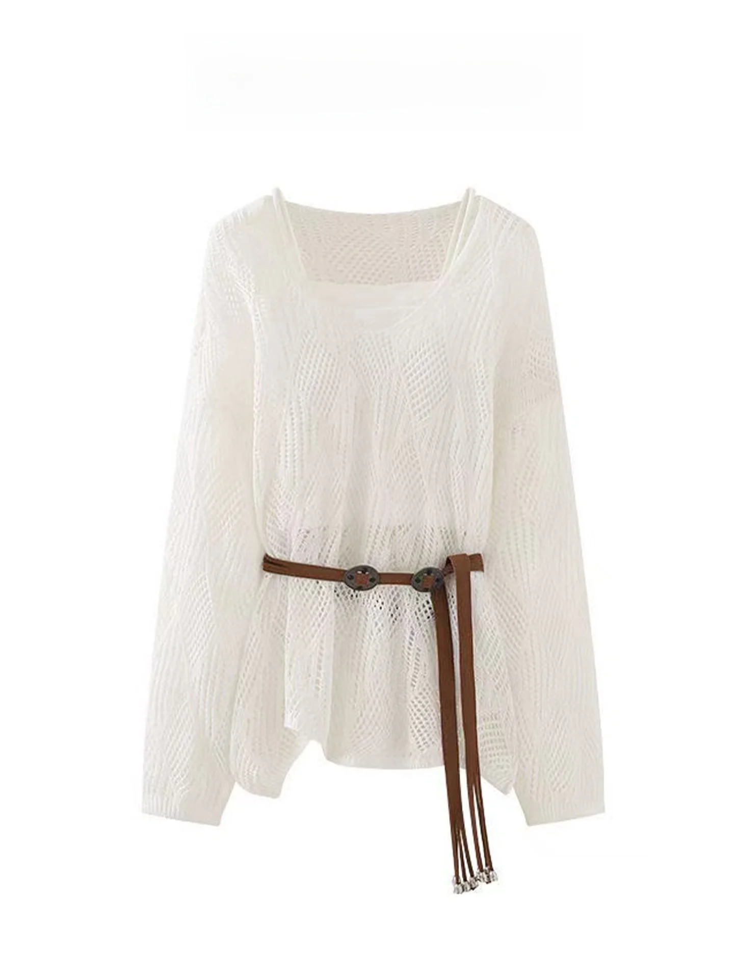 

Женский вязаный комплект из двух предметов: топ с открытыми плечами и свободные брюки. Новинка осени 2025. Модный тренд.