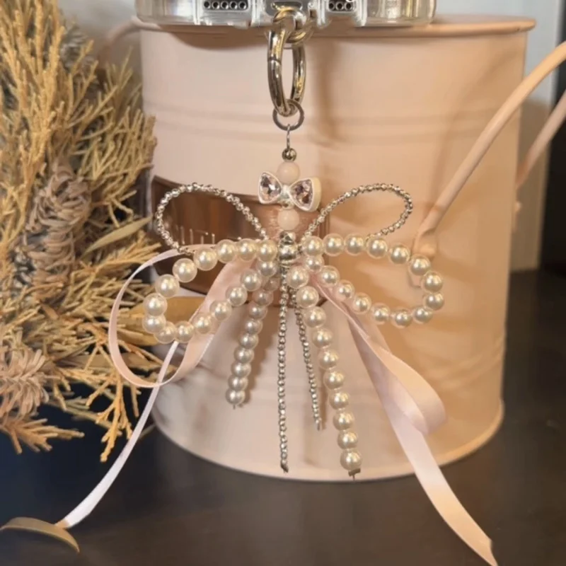 2025 جديد الكورية موضة الحلو اللؤلؤ القوس المفاتيح قلادة هاتف كيرينغ Y2K Ins حامل الجمالية لفتاة حقيبة قلادة اكسسوارات