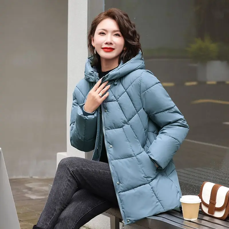 Cappotto moda con cappuccio imbottito in tinta unita con tasca grande autunno nuovo Cappotto imbottito in cotone leggero lungo Joker da donna taglie forti