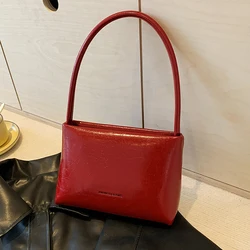 Borsa ascellare elegante da donna bordeaux di fascia alta 2024 nuova borsa a tracolla temperamento lettera moda donna borsa trama pendolare