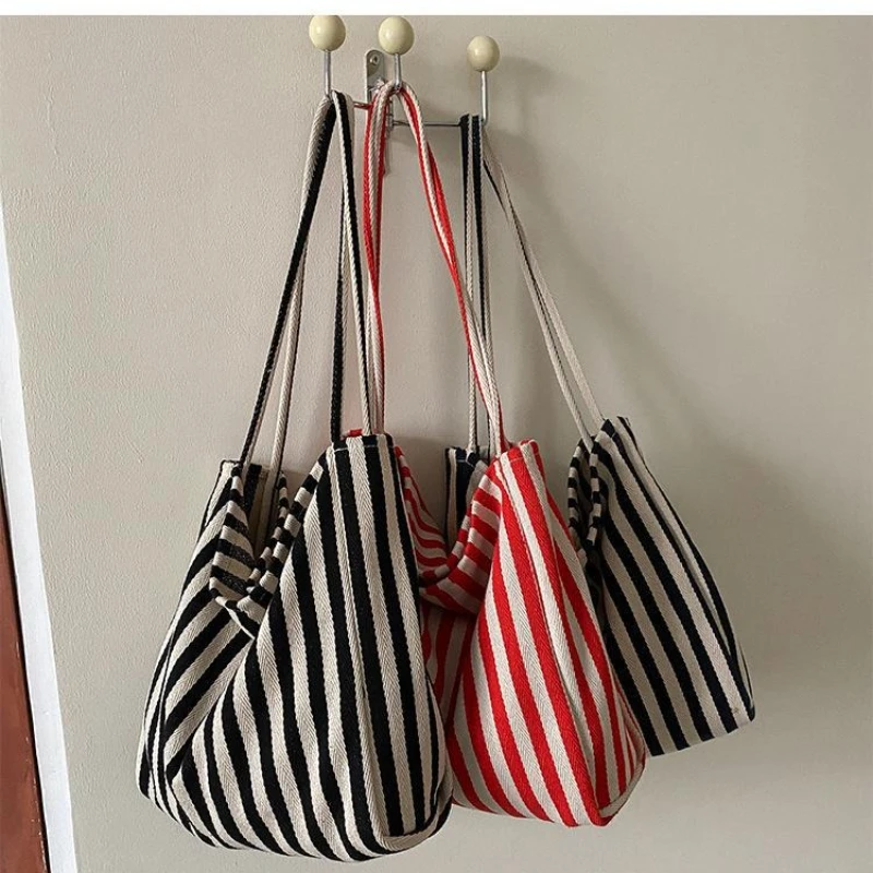 

2025 Female Casual Multifunctional Travel Tophandle Handbag Large Capacity Canvas Women Shopper Tote Simple Striped Shoulder Bag