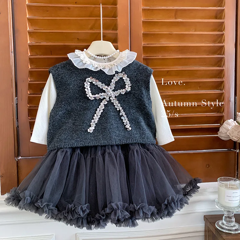 

A.Girls' Autumn New Fashion Versatile Casual Loose Bow Knitted Vest and Skirt Set